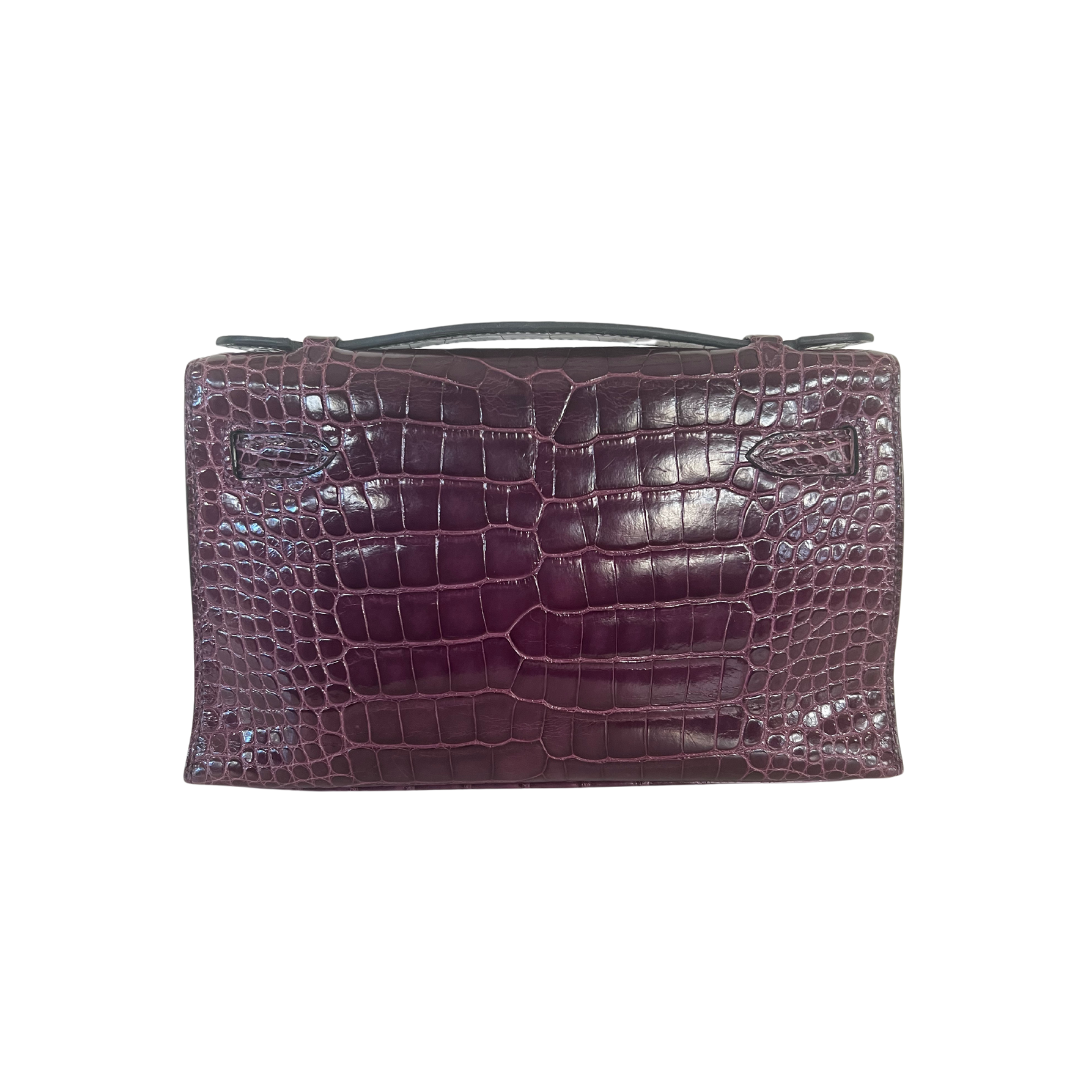 HERMES Pochette Kelly in coccodrillo ametista